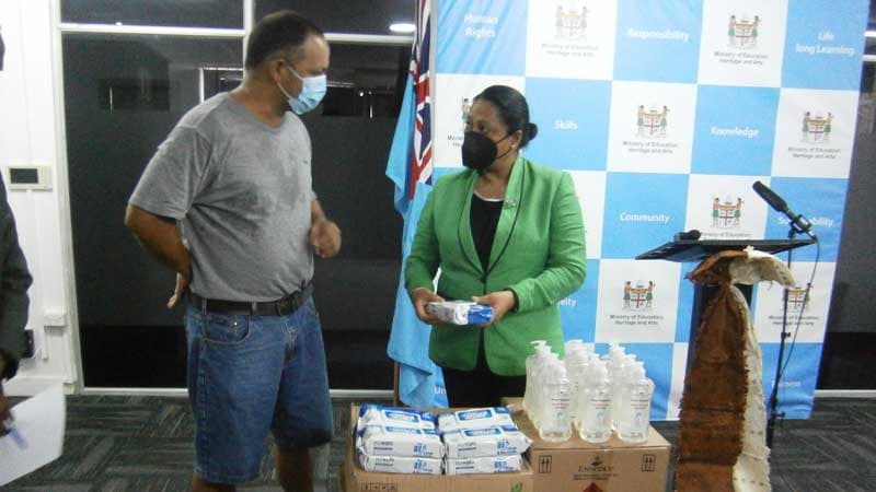 Fiji Chemicals representative presenting disinfectant products to Fiji's education ministry