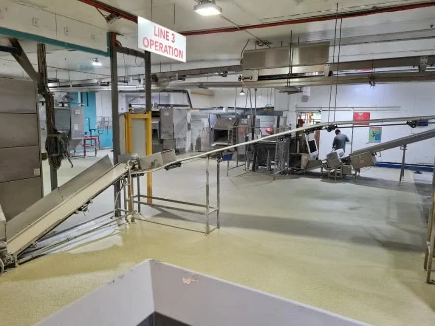 An industrial production area with flooring using recycled glass