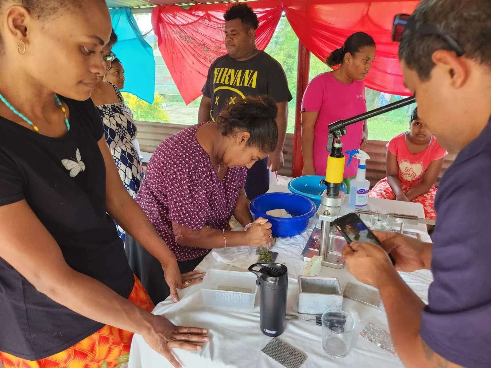 Participants pressing and preparing soap at Loloma Home